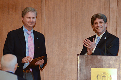Chancellor Holden Thorp accepts the Dean's Award